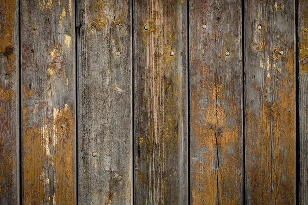 Holzhintergrund mit verwittertem Holz und rostigen Nägeln — Stockfoto