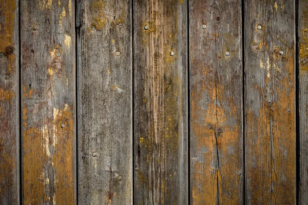 Fondo in legno con legno intemperie e chiodi arrugginiti — Foto Stock