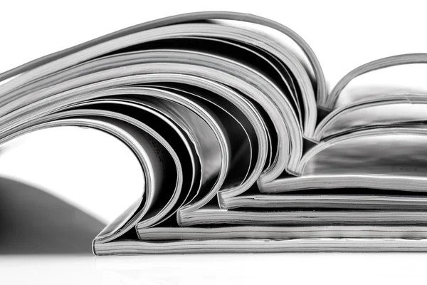 Stack of magazines on white background — Stock Photo, Image