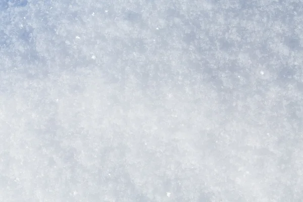 Flocos de neve branco textura de fundo — Fotografia de Stock