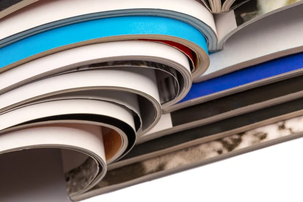 Stack of magazines on white background — Stock Photo, Image