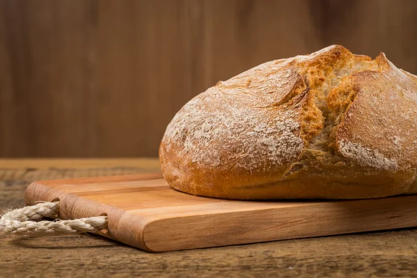 white bread over wooden background