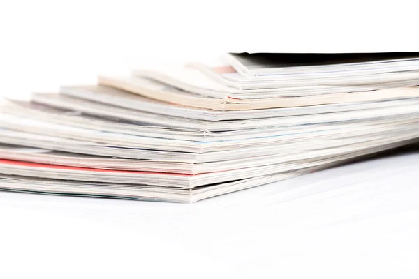 Magazines up close shot on white background — Stock Photo, Image