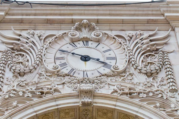 Ulicę Augusta zegar, Lizbona, Portugalia — Zdjęcie stockowe