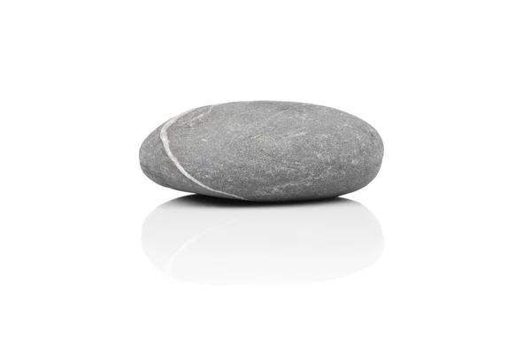 Камень над белым — стоковое фото