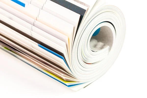 Rolled up magazine — Stock Photo, Image