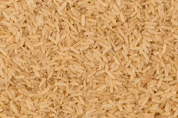 Коричневый рисовый фон — стоковое фото