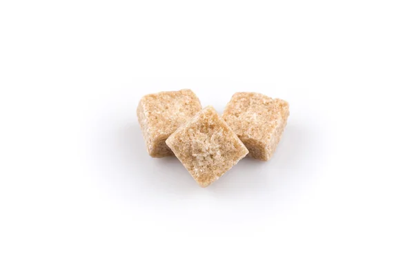 Brown sugar cubes isolated — Stock Photo, Image