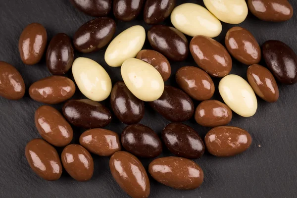 Almonds in chocolate — Stock Photo, Image