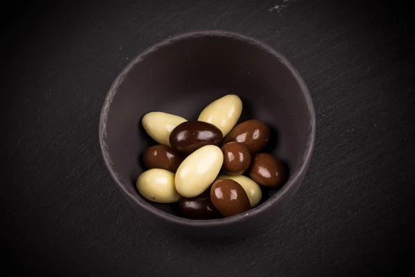 Almonds in chocolate — Stock Photo, Image