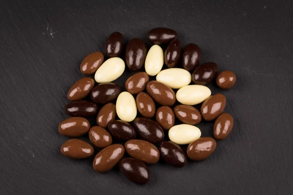 Almonds in chocolate — Stock Photo, Image