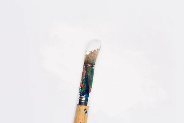 Used paint brush in white color — Stock Photo, Image