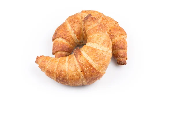 Croissant over witte achtergrond — Stockfoto