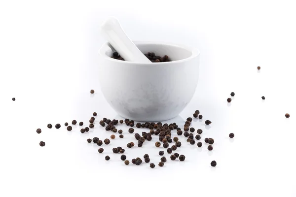 Peppercorns in mortar and pestle — Stock Photo, Image