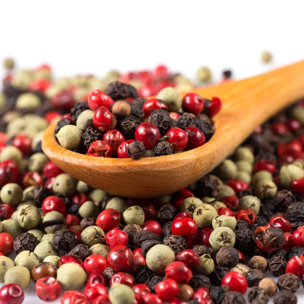 Pepper seasoning mix in wooden spoon — Stock Photo, Image