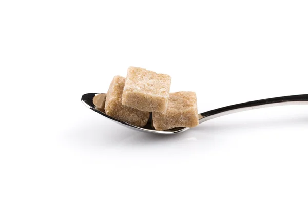 Kostki cukru na łyżki — Zdjęcie stockowe