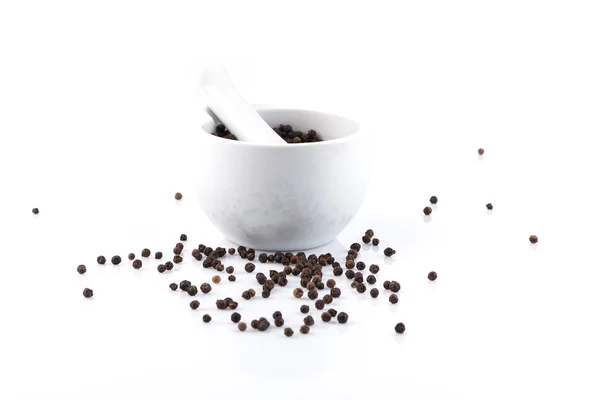 Peppercorns in mortar and pestle — Stock Photo, Image