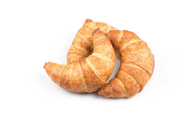 Croissant over white background — Stock Photo, Image