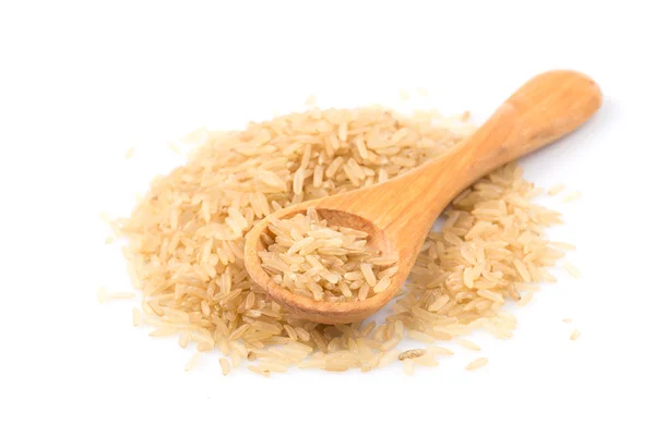 Brown rice over the spoon — Stock Photo, Image