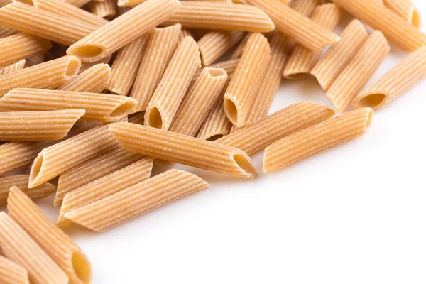 Pasta Penne integral Imagen De Stock