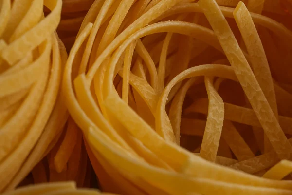 Pastas italianas secas, nidos de Fettuccine — Foto de Stock