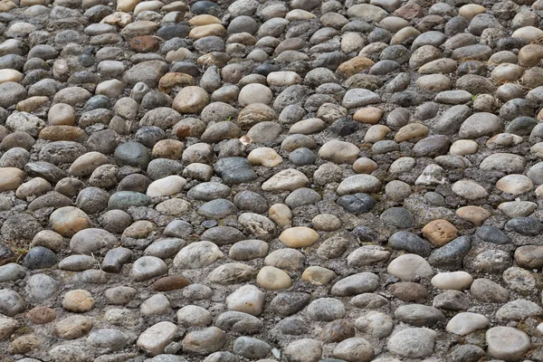 Floor walkway made of small pebbles — Stock Photo, Image