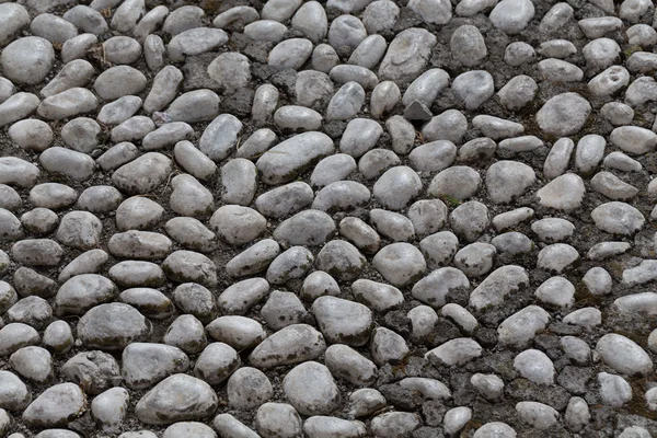 Vloer loopbrug gemaakt van kleine steentjes — Stockfoto