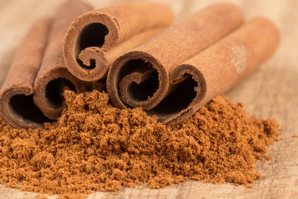 Cinnamon sticks with powder