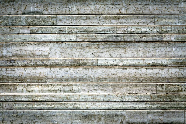 Šedá kamenná zeď textura — Stock fotografie