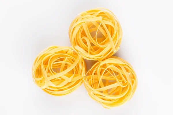 Fettuccine pasta on white — Stock Photo, Image