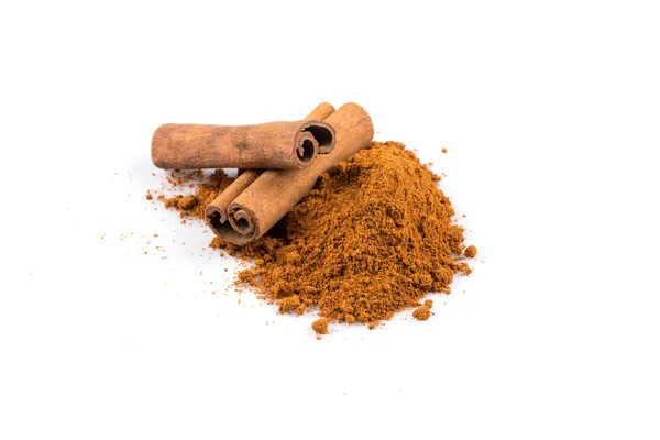 Cinnamon sticks with powder — Stock Photo, Image