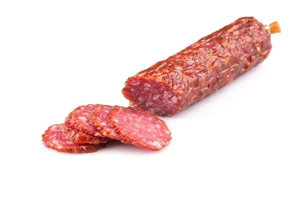 Salami tranché sur blanc — Photo