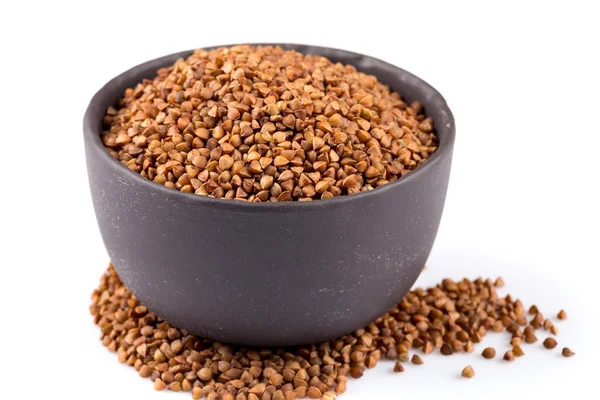 Buckwheat groats in a bowl — Stock Photo, Image