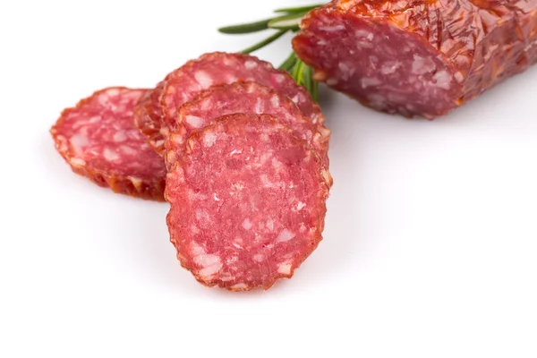 Salame fatiado em branco — Fotografia de Stock