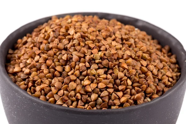 Buckwheat groats in a bowl — Stock Photo, Image