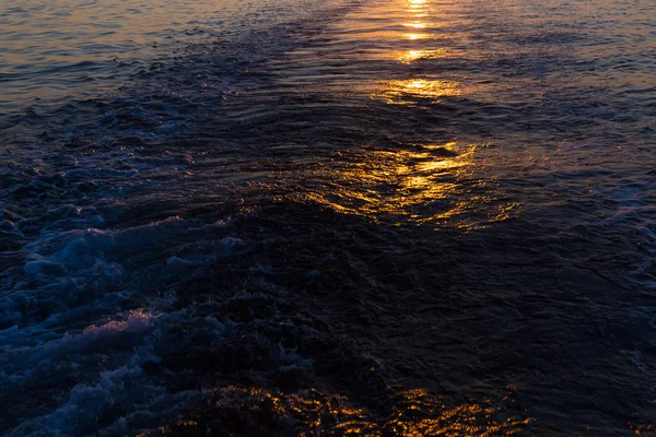 Sea sunset with ship trace — Stock Photo, Image