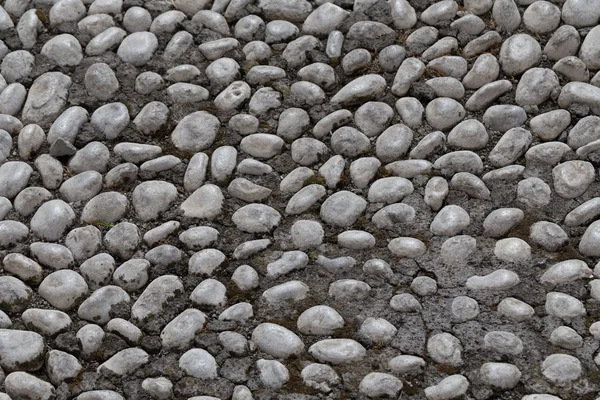 Floor walkway made of small pebbles — Stock Photo, Image