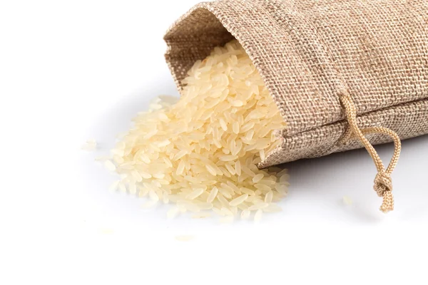 Long grain rice on white background — Stock Photo, Image