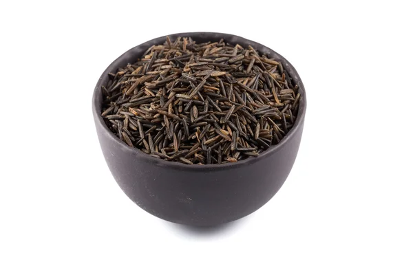 Wild brown rice in bowl — Stock Photo, Image