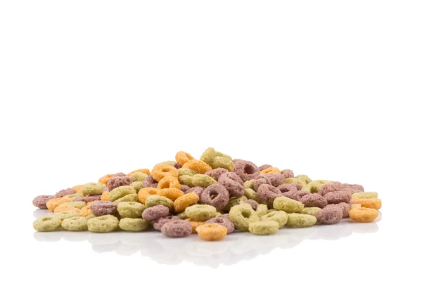 Cereali colorati su bianco — Foto Stock