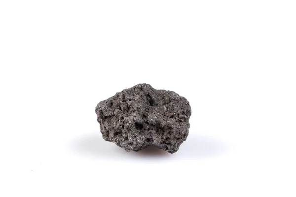 Вулканічні камені на білому тлі — стокове фото
