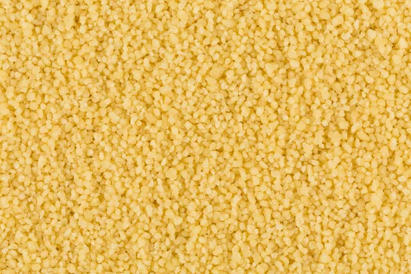 Couscous como textura de fundo — Fotografia de Stock