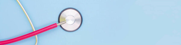 stethoscope for medical examination on a blue background. Copy space