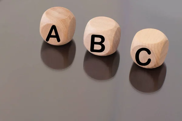 wooden cubes with the letters ABC . Business. Finance