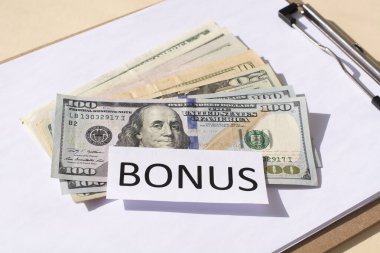 Nakit para ve BONUS kelimesi. İkramiye kavramı