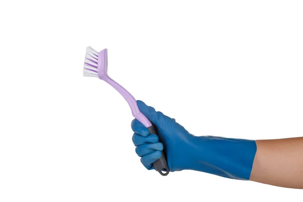 Ręka z rękawiczką stosując szczotka do czyszczenia — Zdjęcie stockowe