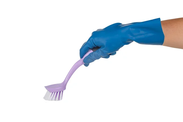 Mano con guante usando cepillo para limpiar — Foto de Stock