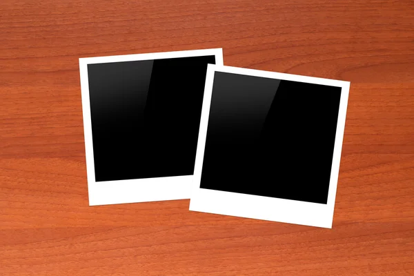 Blank Picture Frames on Wooden Table — Stock Photo, Image