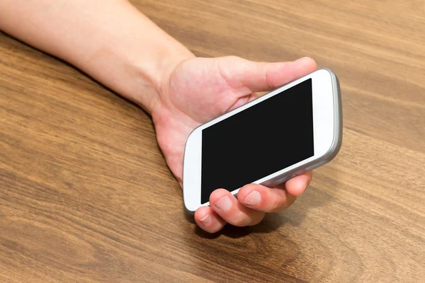 Hand houden smartphone — Stockfoto