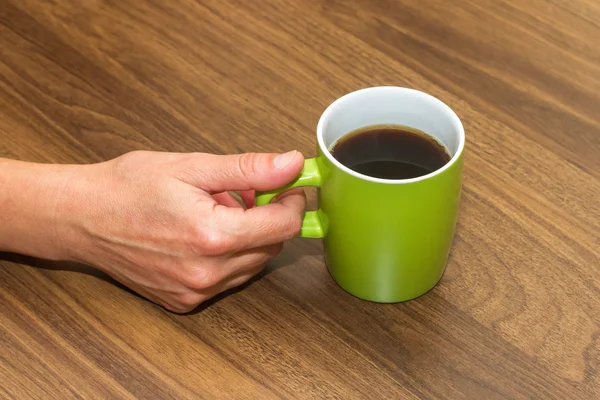 Woman Hand Holding Green Mug — Stock Photo, Image